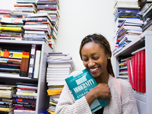 woman in office full of books